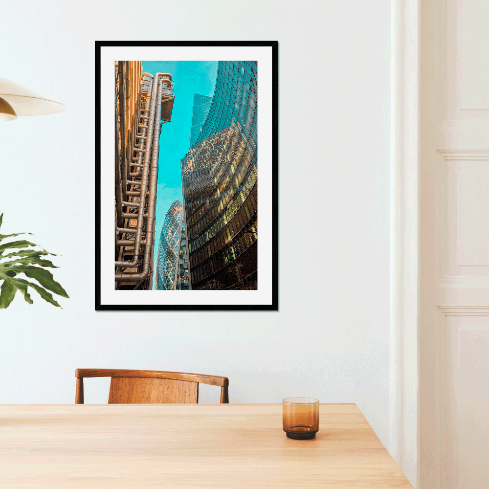 Framed & Mounted Print of Futuristic Gherkin London and several futuristic buildings